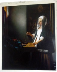 Woman-Holding-a-Balance-reproduction-vermeer